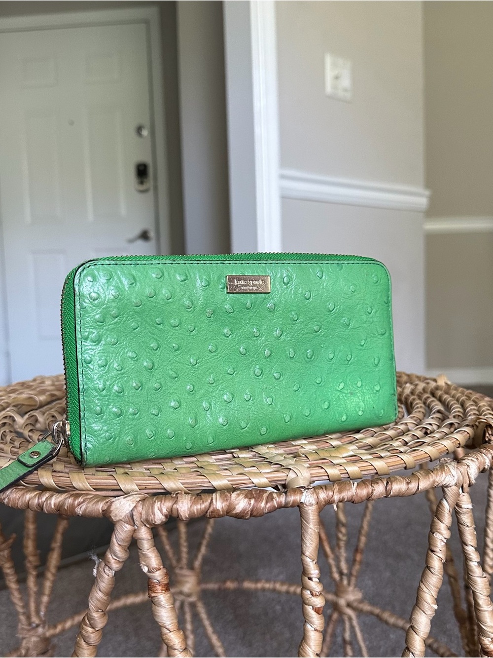 kate spade green embossed zip-around wallet